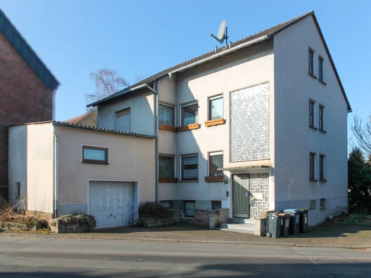 VR Immobilien GmbH - Immobilienangebot - Burghaun - Alle - VERKAUFT: Zweifamilienhaus mit Ausbaureserve in guter Lage von Steinbach